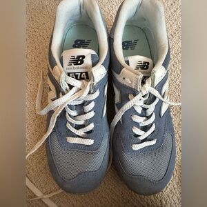 New Balance 574. Light blue. Unisex size 7, or equal to women’s 8.5.